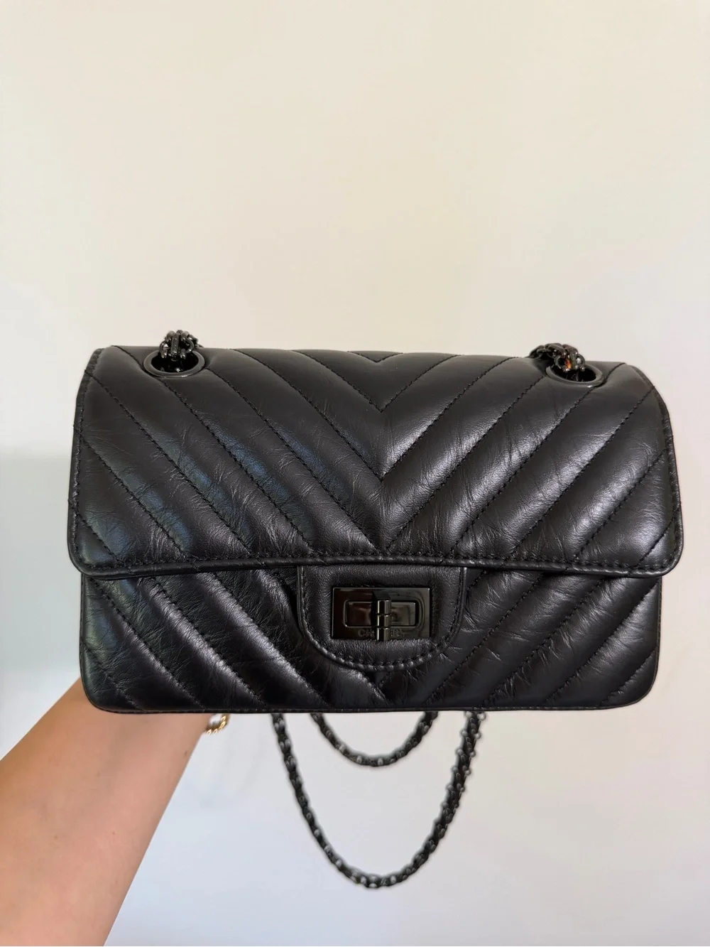 CHANEL SO BLACK REISSUE 2.55 FLAP CHEVRON AGED CALFSKIN MINI